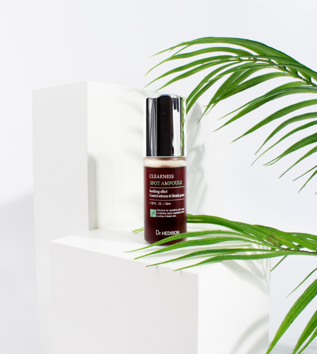 Clearness Spot Ampoule con palmeras.