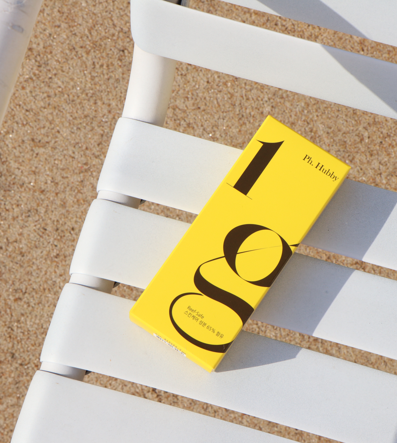 Sun Cream Intensive Protection en silla.